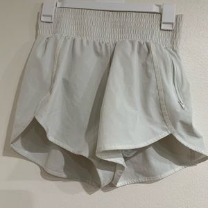 Running/workout shorts attached legging shorts. Zipper pocket Women’s Size Small